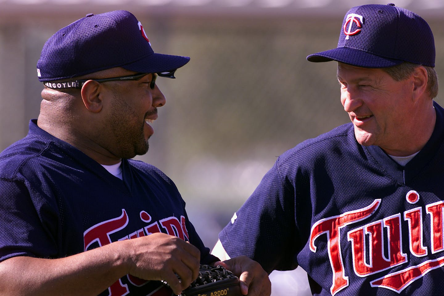 Twins great Kirby Puckett shares a laugh with coach Rick Stelmaszek during the first day of full squard spring training in Fort Myers. ORG XMIT: MIN2017110616443548