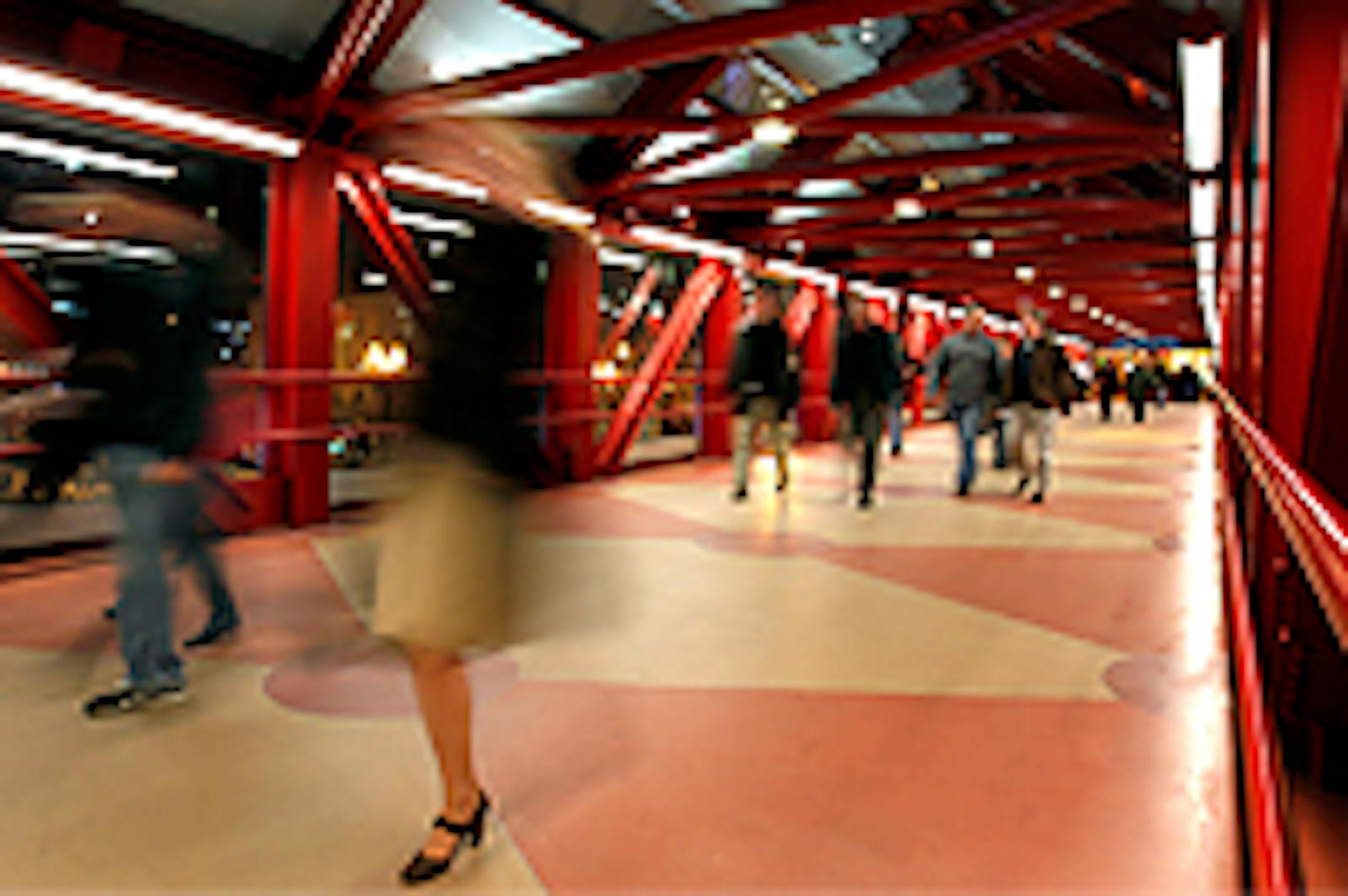 Wolves fans walk the skyway from Block E to Target Center