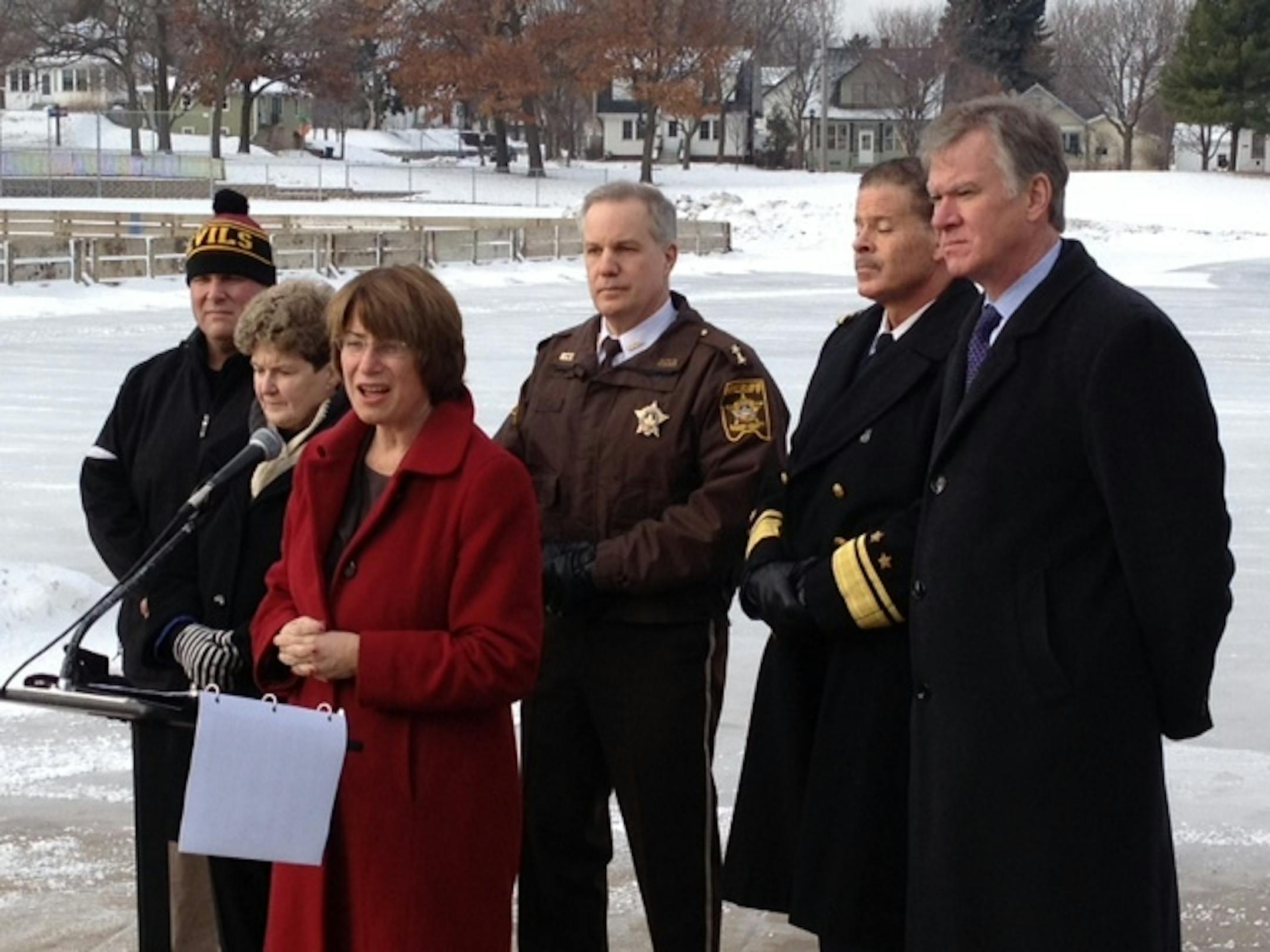 Sen. Amy Klobuchar held a press conference in St. Paul Wednesday to discuss her efforts to combat metal thefts. Standing behind her are Bill Burkhart, left, of the Johnson-Como Hockey Association; Minneapolis City Council President Barb Johnson; Ramsey County Sheriff Matt Bostrom; St. Paul Police Chief Thomas Smith, and St. Paul Mayor Chris Coleman.