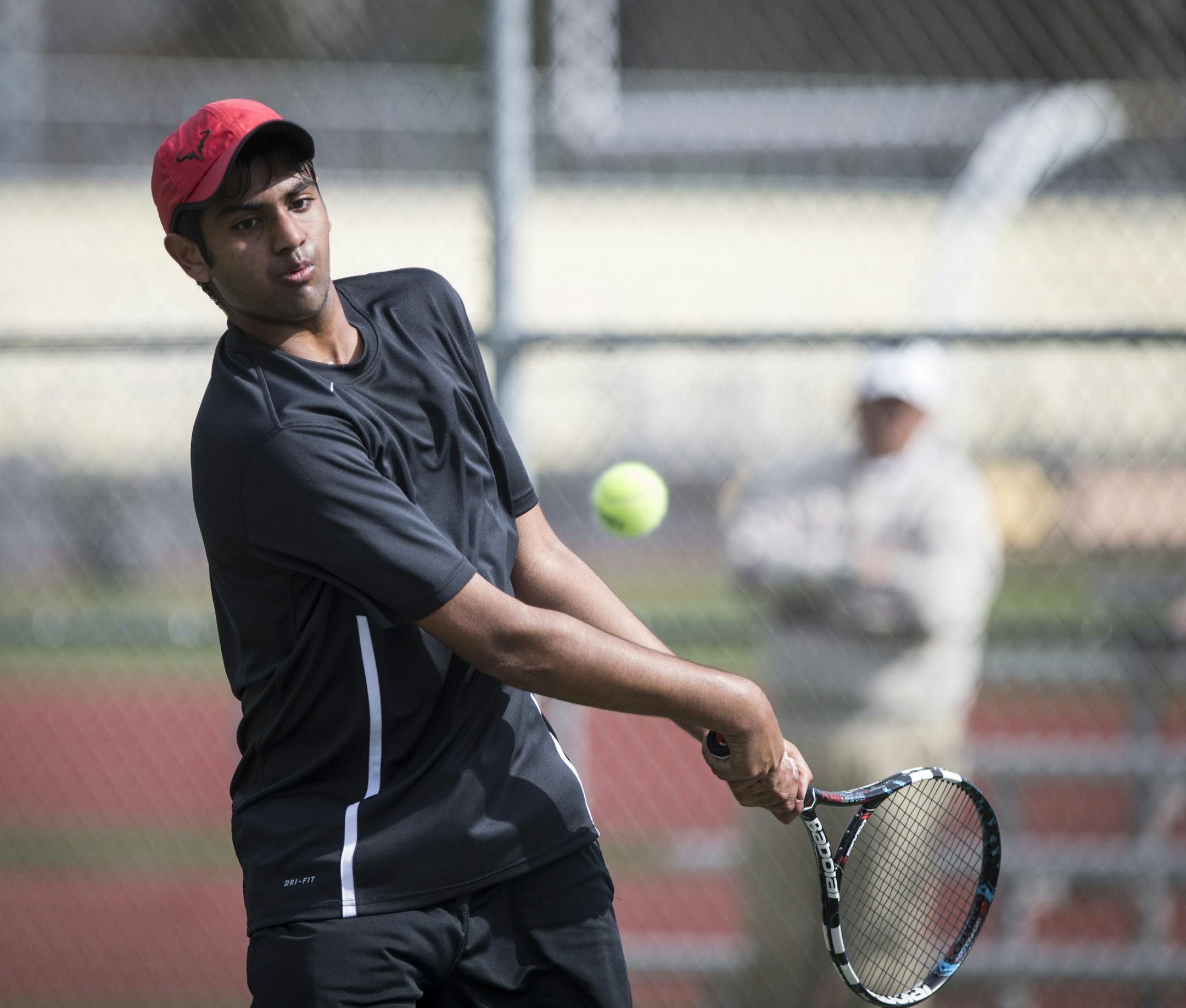 Rajadurai Arul, who teamed with Allen to make the state tournament in doubles last year, plays No. 3 singles this year. (Renee Jones Schneider, Star Tribune)
