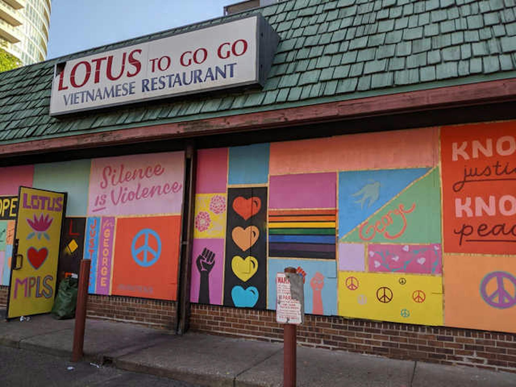 The Vietnamese spot Lotus Restaurant at 113 W Grant St. in Minneapolis is covered in messages of solidarity, peace and hope for a new future following protests that broke out over the killing of George Floyd by Minneapolis police.