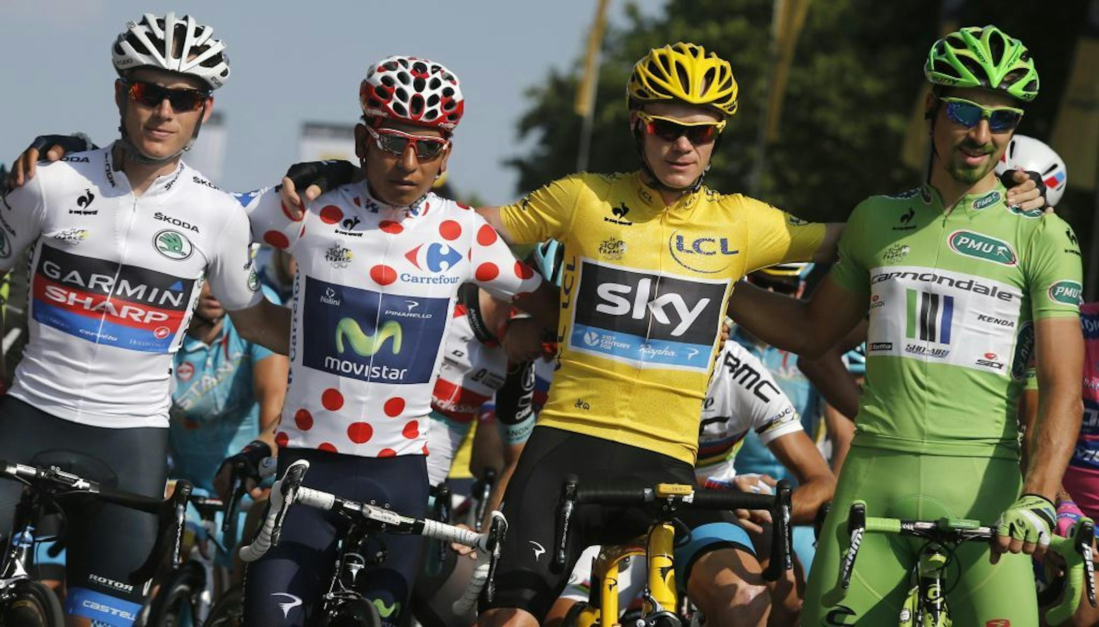 Andrew Talansky of the U.S., wearing the best young rider's white jersey, Nairo Alexander Quintana of Colombia, wearing the best climber's dotted jersey, Christopher Froome of Britain, wearing the overall leader's yellow jersey, and Peter Sagan of Slovakia, wearing the best sprinter's green jersey, pose prior to the start of the 21st and last stage of the 100th edition of the Tour de France cycling race over 133.5 kilometers (83.4 miles) with start in Versailles and finish in Paris, France, Sund