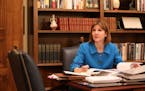 Minnesota Attorney General Lori Swanson talked with her spokesperson Ben Wogsland as she reviewed evidence in the case of President Donald Trump's imm