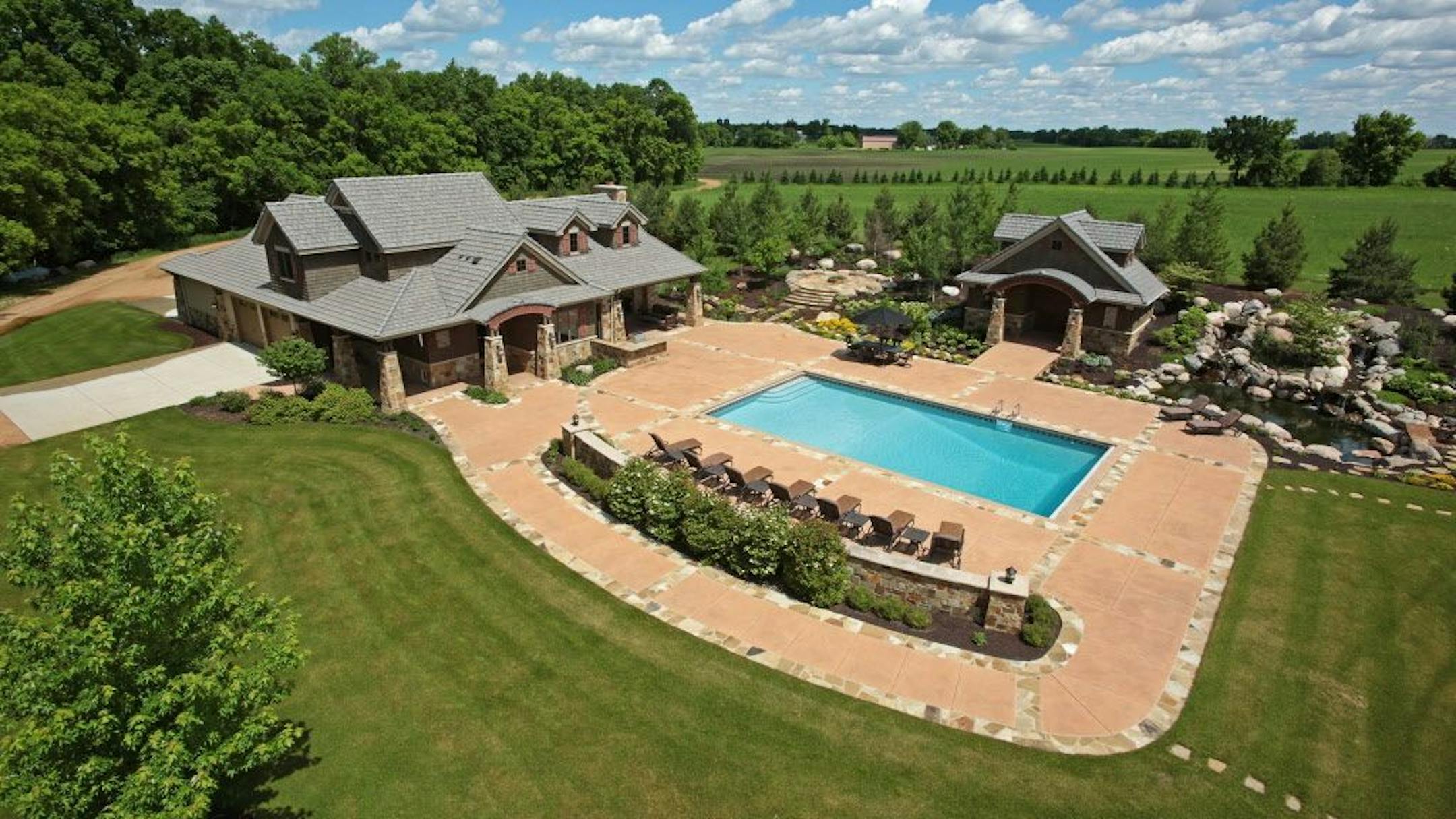 Also on the property is a large pool and a separate poolhouse guest residence.