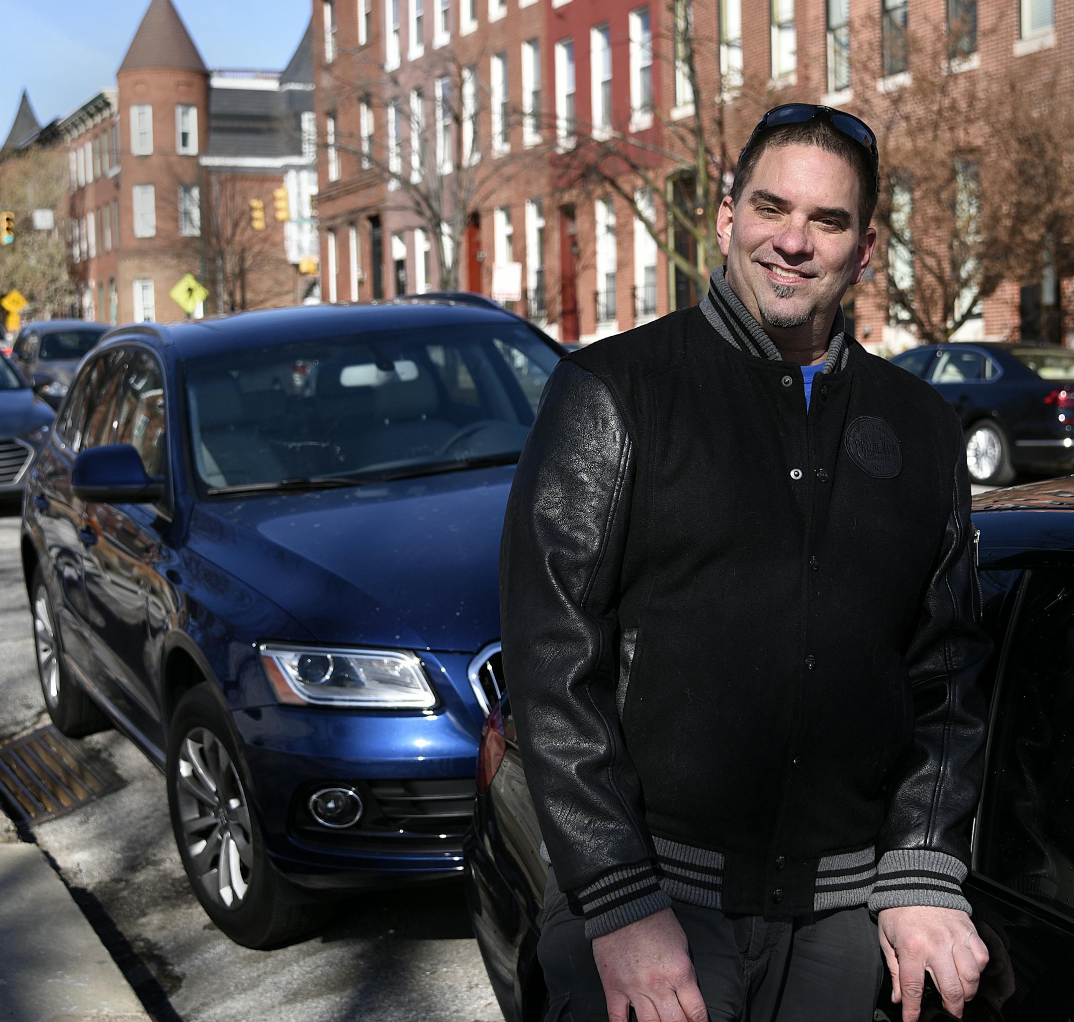 Patrick Campbell of Baltimore rents out his BMW and Audi luxury vehicles with the Turo ride-sharing service.