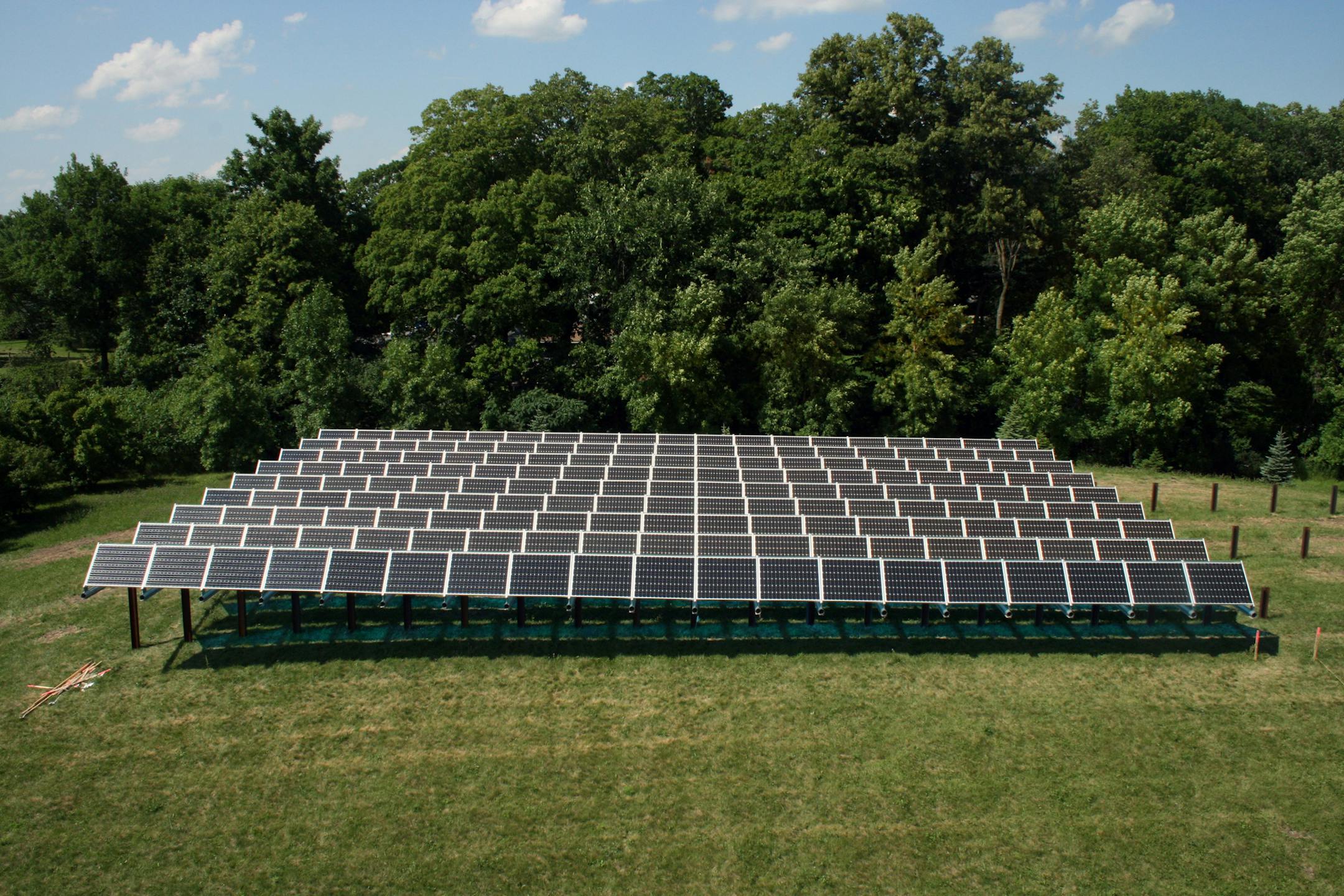 This July 2013 photo provided by the Wright Hennepin Cooperative Electric Association shows the first community solar array in Minnesota, in Rockford, Minn. A sweeping state energy law approved this spring demands that utilities generate or procure 1.5 percent of their power from solar sources by 2020 ó a big step up from where the state is now. Under that law, Xcel Energy Inc. has until Monday, Sept. 30, 2013, to tell how the giant electricity provider would like to manage the rollout of t