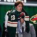Charlie Stramel donned a Wild sweater after being taken 21st overall in the NHL draft on Wednesday night in Nashville.