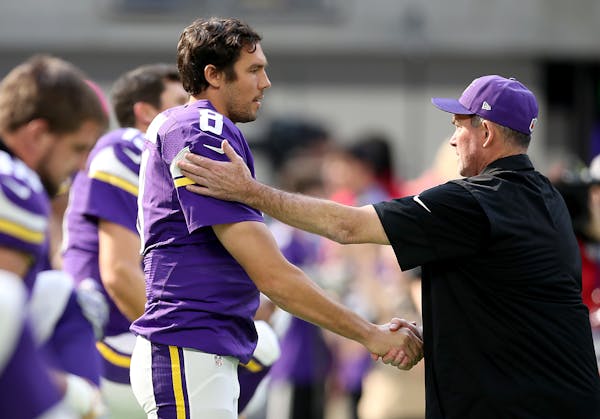 Vikings quarterback Sam Bradford was greeted by coach Mike Zimmer during warmups before facing the Houston Texans on Sunday at U.S. Bank Stadium.