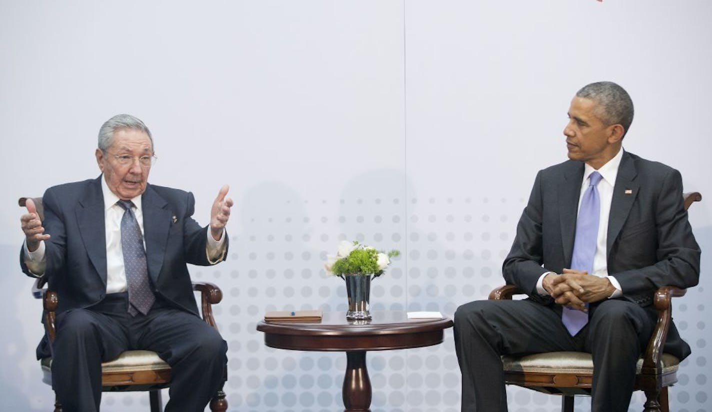 U.S. President Barack Obama, right, meets with Cuban President Raul Castro at the Summit of the Americas in Panama City, Panama on Saturday, April 11, 2015. The leaders of the United States and Cuba held their first formal meeting in more than half a century on Saturday, clearing the way for a normalization of relations that had seemed unthinkable to both Cubans and Americans for generations.