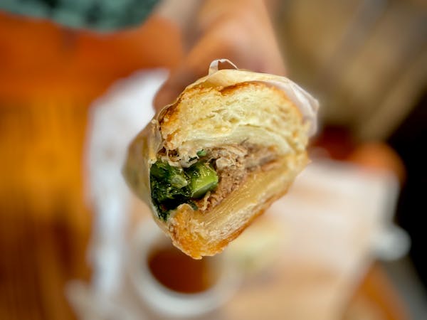 South Lyndale Liquor’s roast pork sandwich with bitter greens is like a porkier French Dip from sandwich master Matthew Bickford.