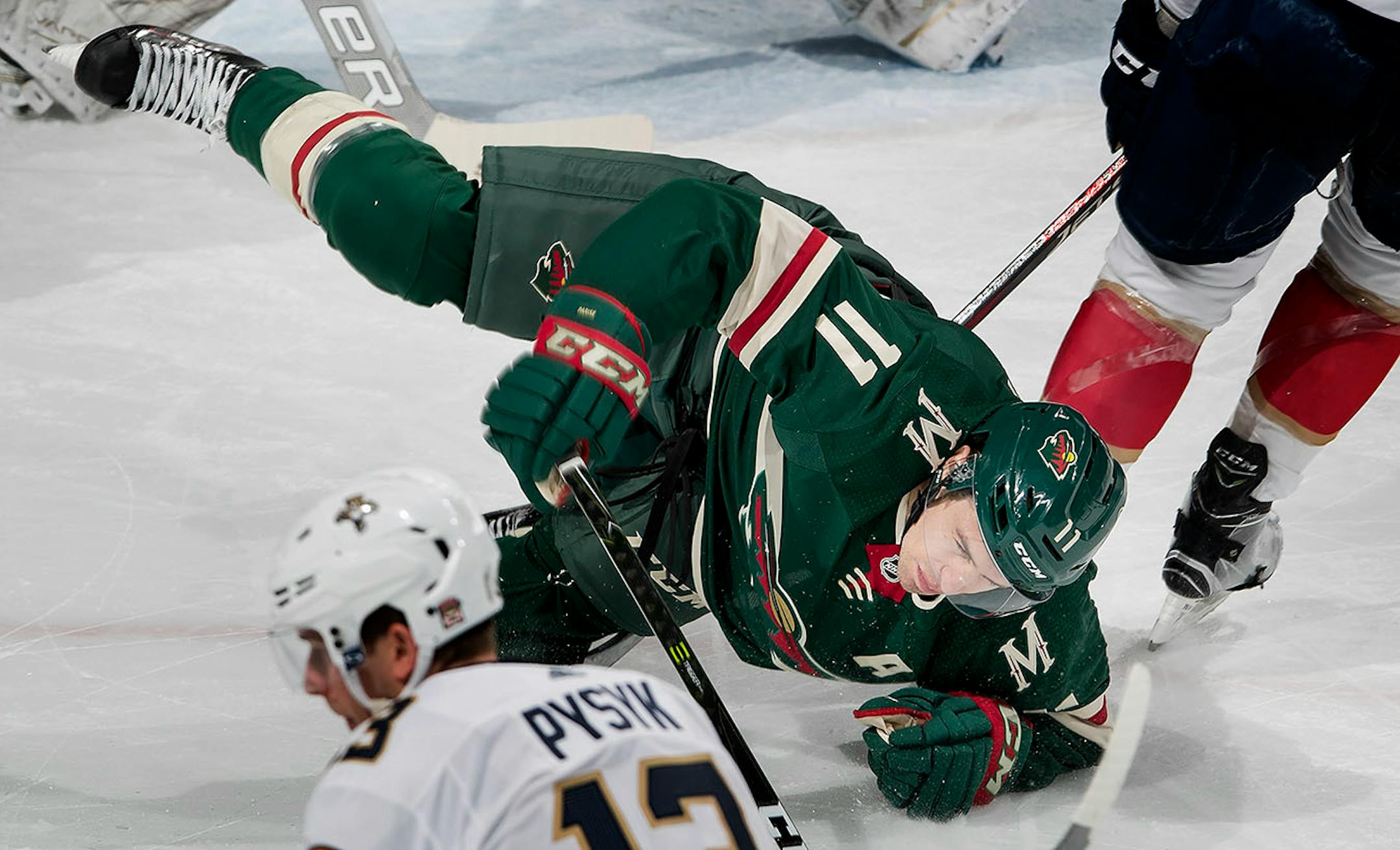 Zach Parise (11) got tripped up in the third period.