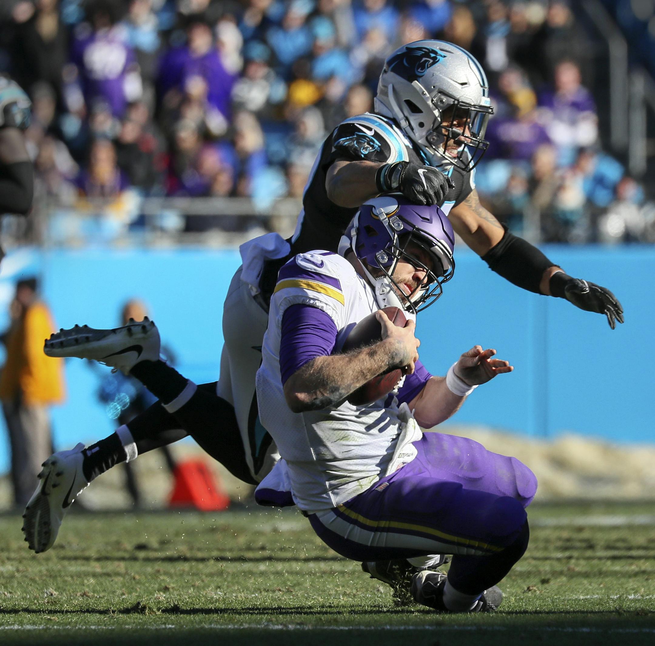 Vikings quarterback Case Keenum scrambled for the first down lat in the 1st half and is hit high by Panthers Kurt Coleman. ] Minnesota Vikings vs Carolina Panthers - Bank of America Stadium
BRIAN PETERSON &#xef; brian.peterson@startribune.com
Charlotte, NC 12/10/2017