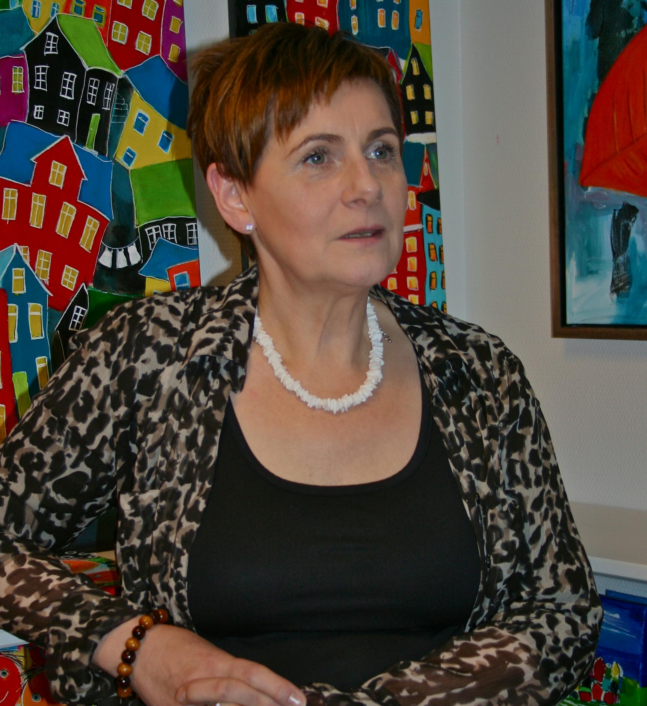 Runa Sivertsen, a former member of the Faroes Parliament, speaks during an interview at Klaksvik, in the Faroe Islands, under the sovereignty of Denmark, on Monday, Dec. 3, 2012. Sivertsen, who also heads a group that advocates on behalf of patients with a genetic condition called glycogen storage disease, says there has been virtually no national discussion of FarGen, the proposed plan to sequence the islands' citizens' genomes and use the data for medical treatment and research. Photographer: