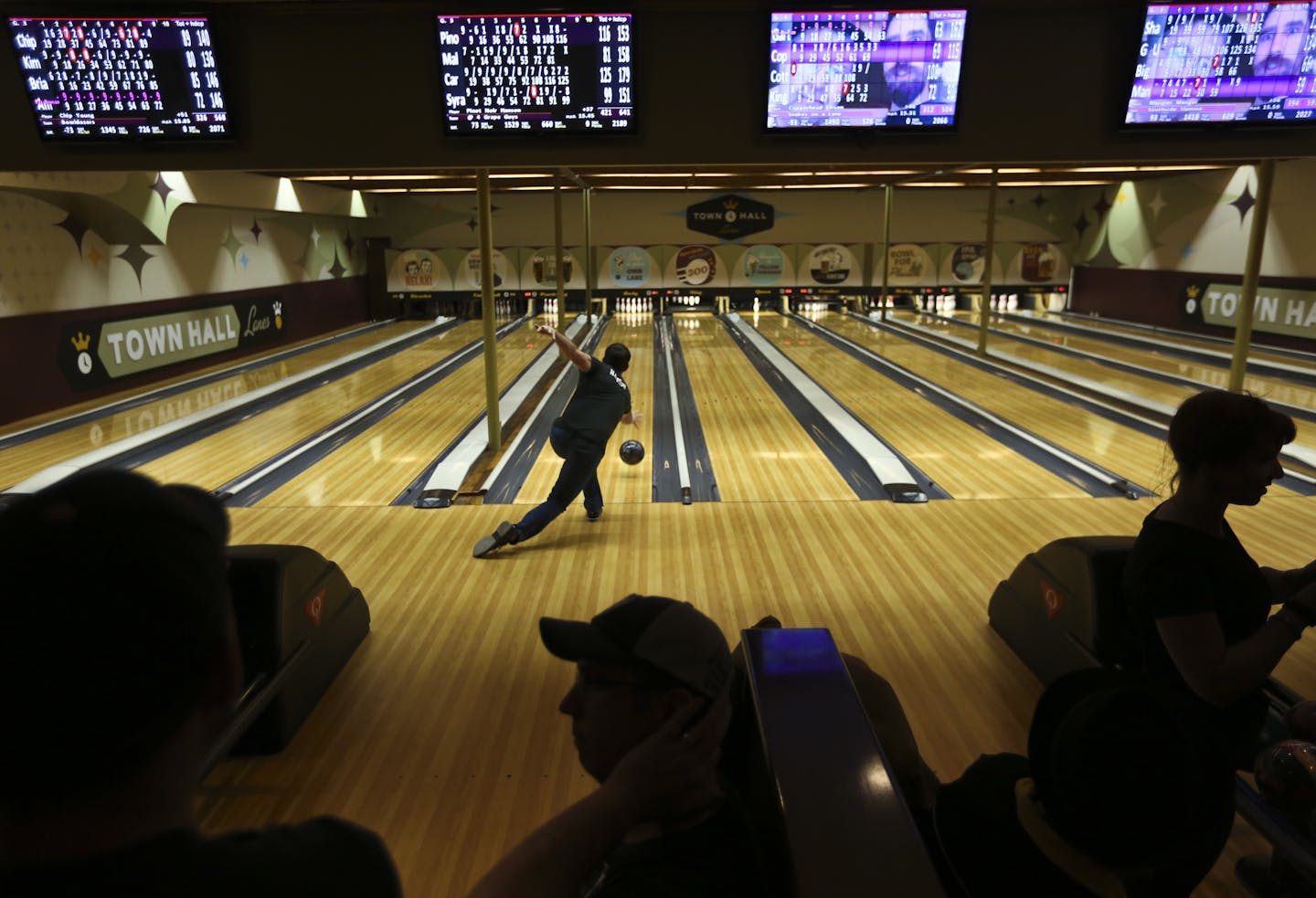 All the alleys were full during league bowling at the Town Hall Lanes in Minneapolis, Minn., on Thursday, March 6, 2014. ] (RENEE JONES SCHNEIDER &#x2022; reneejones@startribune.com)