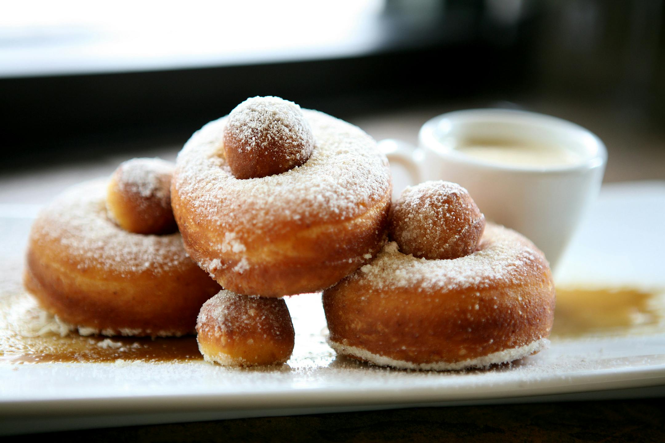 Spiced sweet potato donuts with molasses crema at Corner Table in Minneapolis June 7, 2013. (Courtney Perry/Special to the Star Tribune)