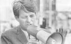 March 29, 1968 ROBERT F, KENNED IN DENVER He used bullhorn to bolster a failing voice Robert F. Kennedy of New York fought his way Thursday night thro