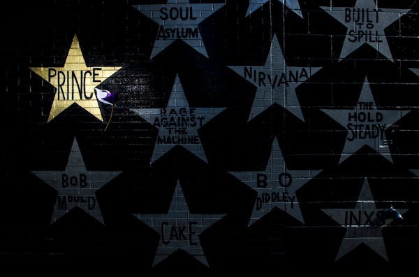 A gold star honoring Prince on the side of First Avenue in downtown Minneapolis. 



  

 ] CARLOS GONZALEZ • cgonzalez@startribune.com - April 16, 