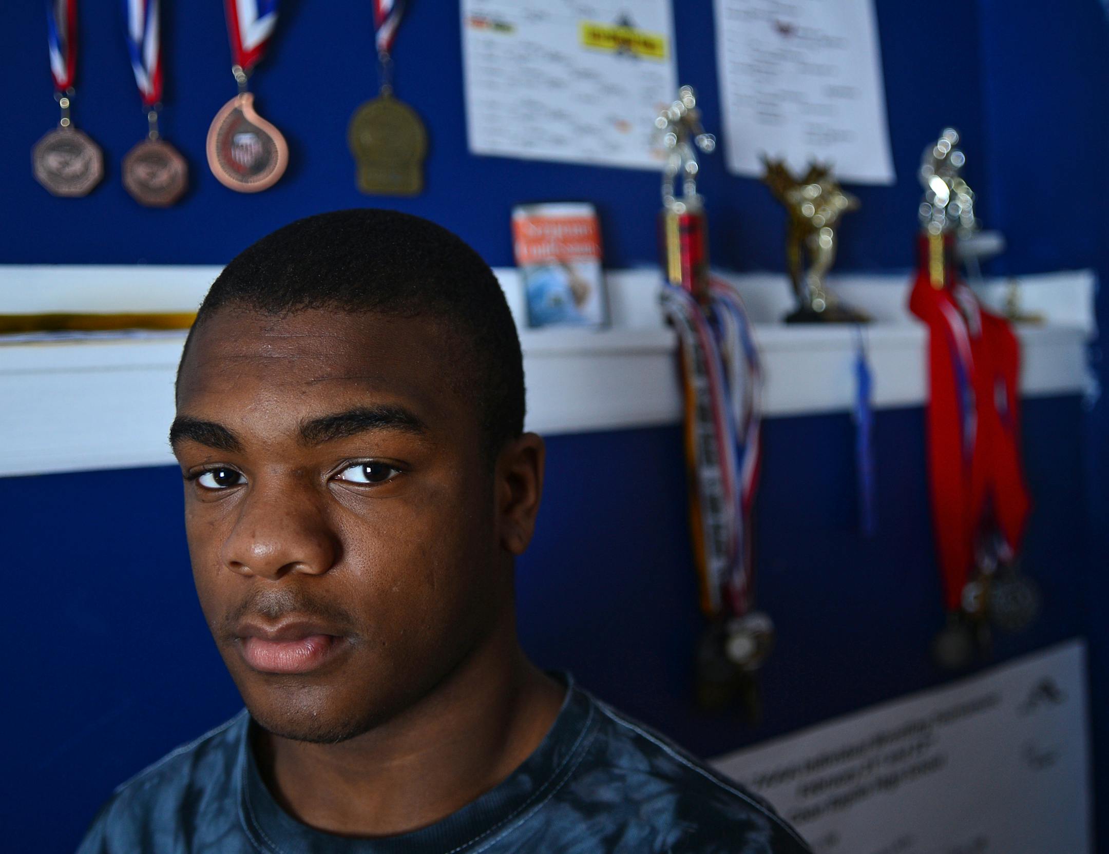 Malik Stewart's bedroom walls are crowded with wrestling medals and trophies. ] After Blaine sophomore wrestler Malik Stewart lost his 3A state title match last week, he hugged his opponent's father, who has cancer. "I told him to stay strong and congratulated him," Malik said this week. "It wasn't something I planned beforehand." Malik didn't plan for the standing ovation that followed or the outpouring of national reaction to his kind gesture, either. Richard.Sennott@startribune.com Richard Se