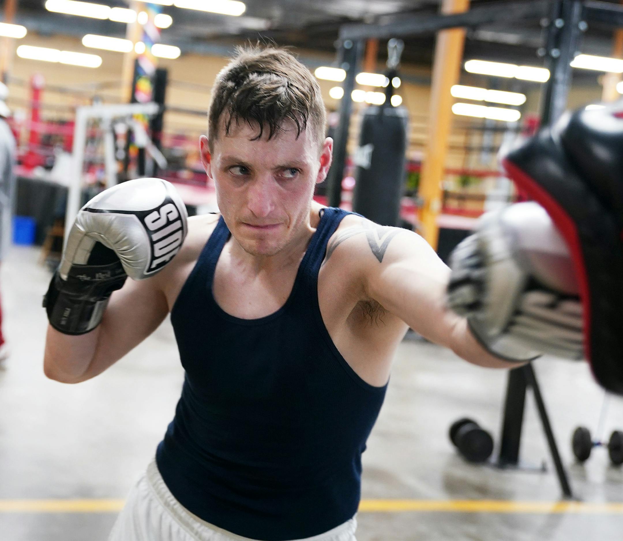 Josh Denn worked out at Mike Evgen's new gym. ] ANTHONY SOUFFLE • anthony.souffle@startribune.com Mike Evgen, the former Rice Street Rocker of area pro boxing fame, worked out with some of his fighters at his new boxing gym the Rice Street Old School Boxing Gym (though it's not on Rice Street) Thursday, Jan. 23, 2020 in St. Paul, Minn.