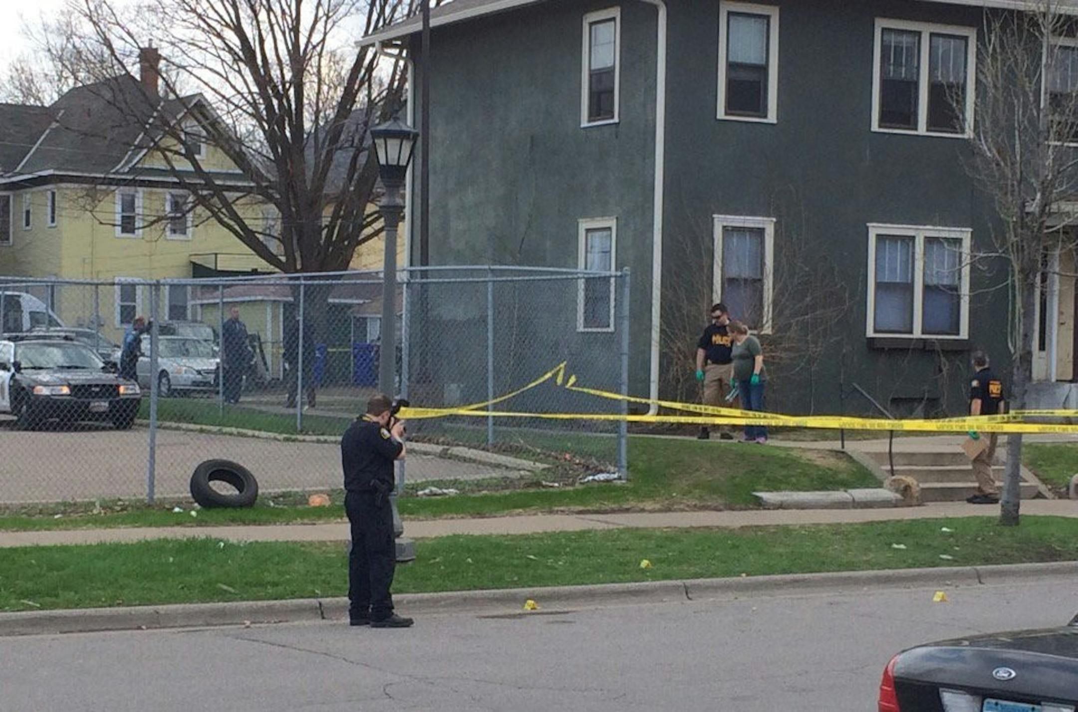 St. Paul police investigate a homicide on the 200 block of Aurora Avenue on Saturday, April 15, 2017. Early reports indicate that one man has been shot near the Minnesota State Capitol.