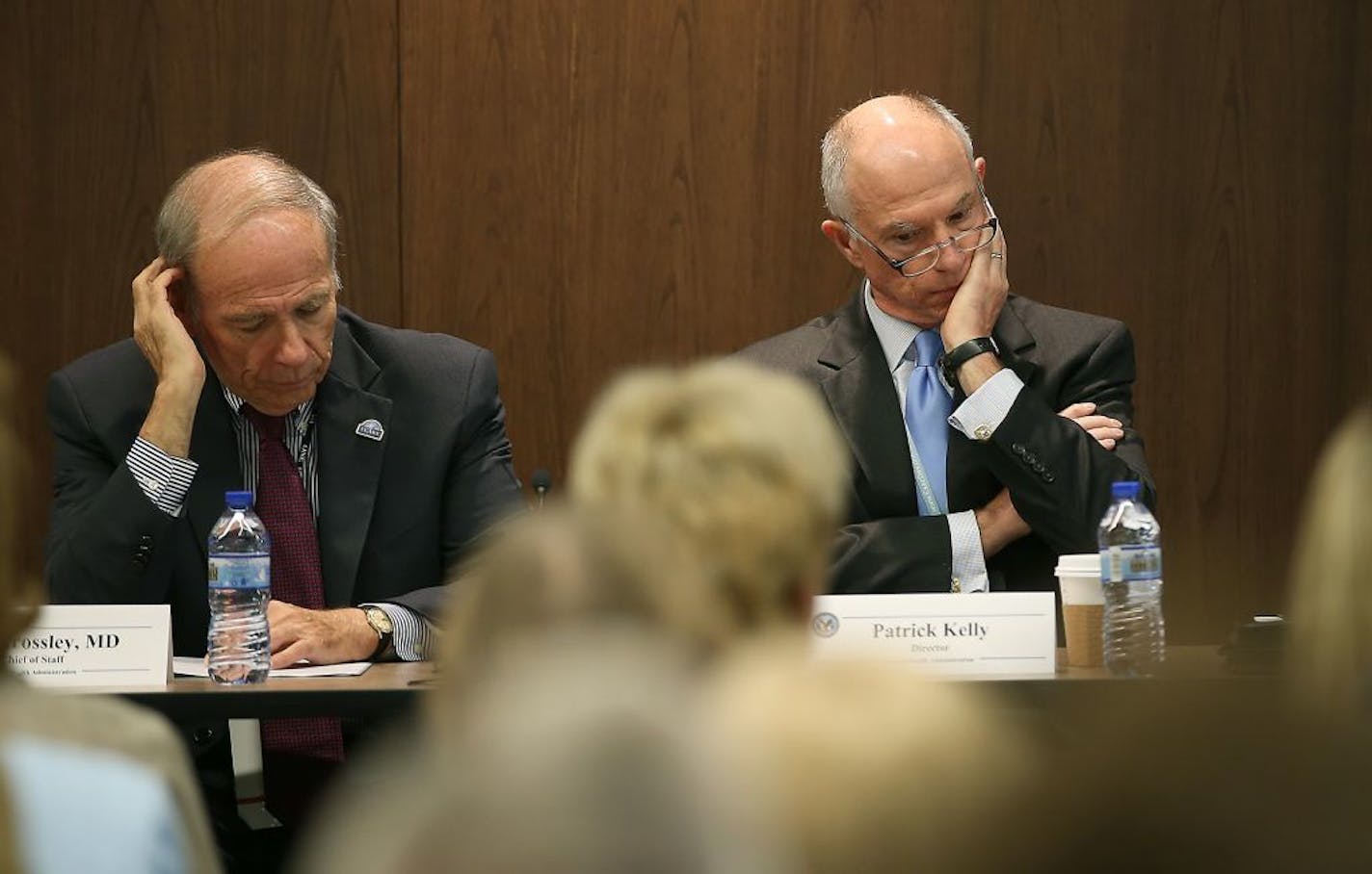 Minneapolis VA Health Care System Chief of Staff, Dr. Kent Crossley, left, and Director of the Minneapolis VA Health Care System Patrick Kelly listened to veterans voice their concerns during a town hall meeting regarding health care and other veterans benefits at the Whipple Federal Building, Friday, September 12, 2014 in St. Paul, MN.