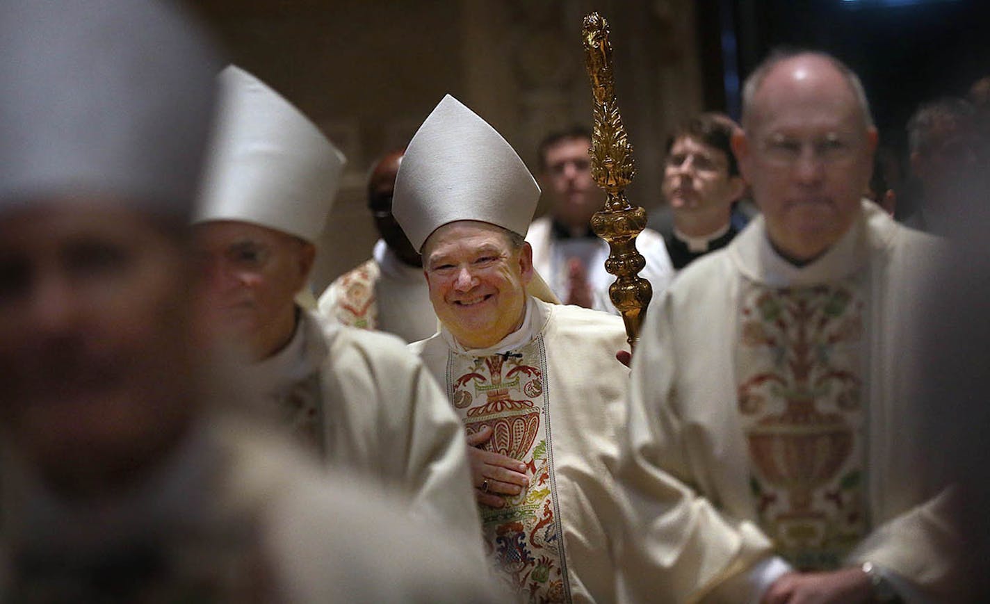 Archbishop Bernard Hebda processed into the Cathedral of St. Paul for the Mass of Installation. ] JIM GEHRZ • james.gehrz@startribune.com / St. Paul, MN / May 13, 2016 /2:00 PM – BACKGROUND INFORMATION: Archbishop Bernard Hebda is installed as archbishop of St. Paul and Minneapolis. Historic ceremony at St. Paul Cathedral at 2. Processional starts at 1:45pm so be there by 1:15pm to check in with Halden or another media person. 1:45 Procession of Clergy with 2:00 p.m. Installation Mass at The Cat