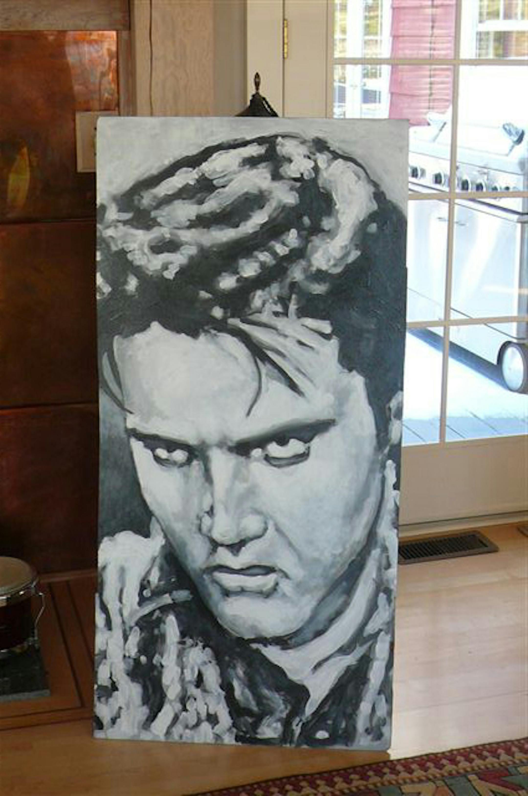 The painting of the King was set outside to help friends find the owner's new home.