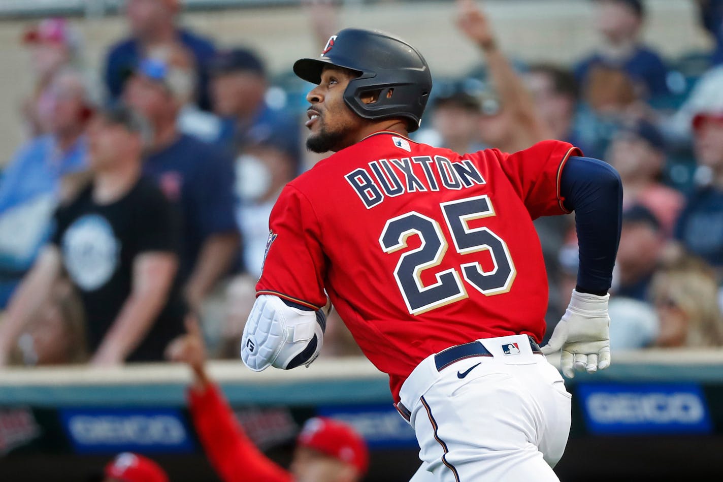 Minnesota Twins' Byron Buxton runs the bases on his solo home run against the Cleveland Guardians during the first inning of a baseball game Friday, May 13, 2022, in Minneapolis. (AP Photo/Bruce Kluckhohn)