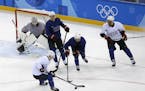 Members of the United States men's hockey team practice ahead of the 2018 Winter Olympics in Gangneung, South Korea, Friday, Feb. 9, 2018.
