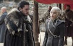 Kit Harington and Emilia Clarke on the season finale of "Game of Thrones."
