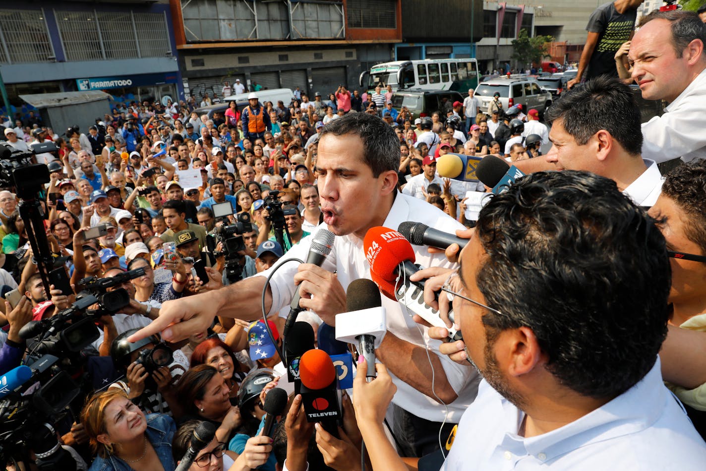 Opposition leader Juan Guaido, who has declared himself Venezuela's interim president, rallied supporters on Wednesday.