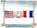 Sack cartoon: Paris handshake