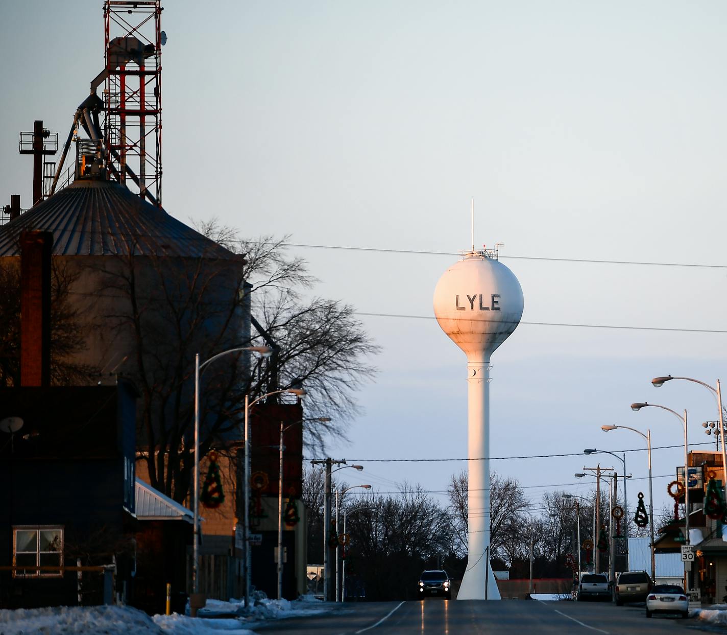 The town of Lyle, Minnesota Friday night. ] (AARON LAVINSKY/STAR TRIBUNE) aaron.lavinsky@startribune.com Not since George H. W. Bush won office in 1988 has Mower County gone Republican in a presidential race. But off the strength of a heavy turnout in small farming communities such as Lyle, it did so in November, putting its hopes for a better future behind GOP candidate Donald Trump. We photograph the town of Lyle on Tuesday, Jan. 3, 2017 in Mower County, Minn.