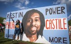 Valerie Castile the mother of Philando Castile stood for a photo in front of a mural of her son during a rally for Philando Castile outside St. Anthon