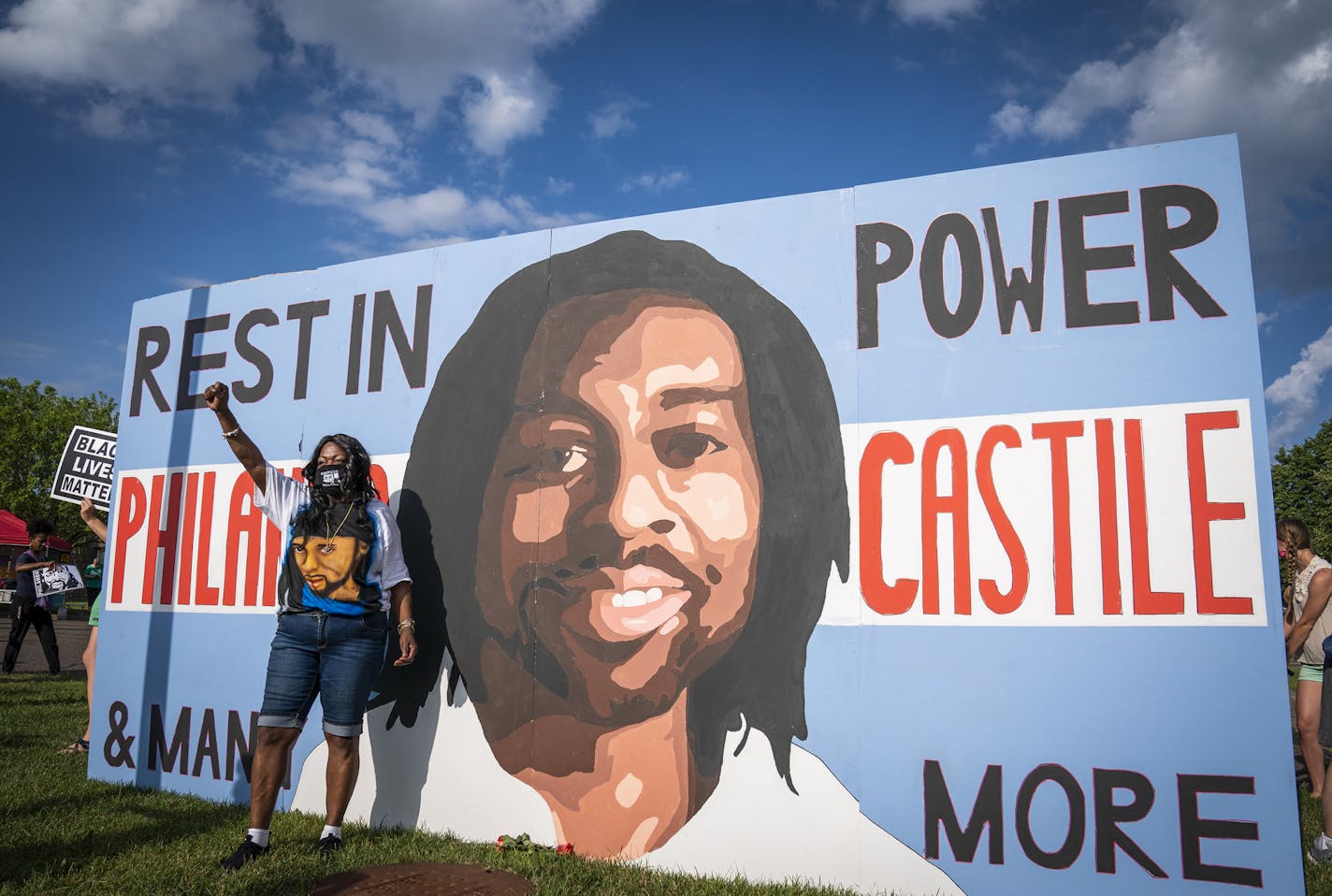 Valerie Castile the mother of Philando Castile stood for a photo in front of a mural of her son during a rally for Philando Castile outside St. Anthony Village City Hall. ] LEILA NAVIDI • leila.navidi@startribune.com BACKGROUND INFORMATION: A rally outside St. Anthony Village City Hall on the fourth anniversary of the death of Philando Castile on Monday, July 6, 2020.