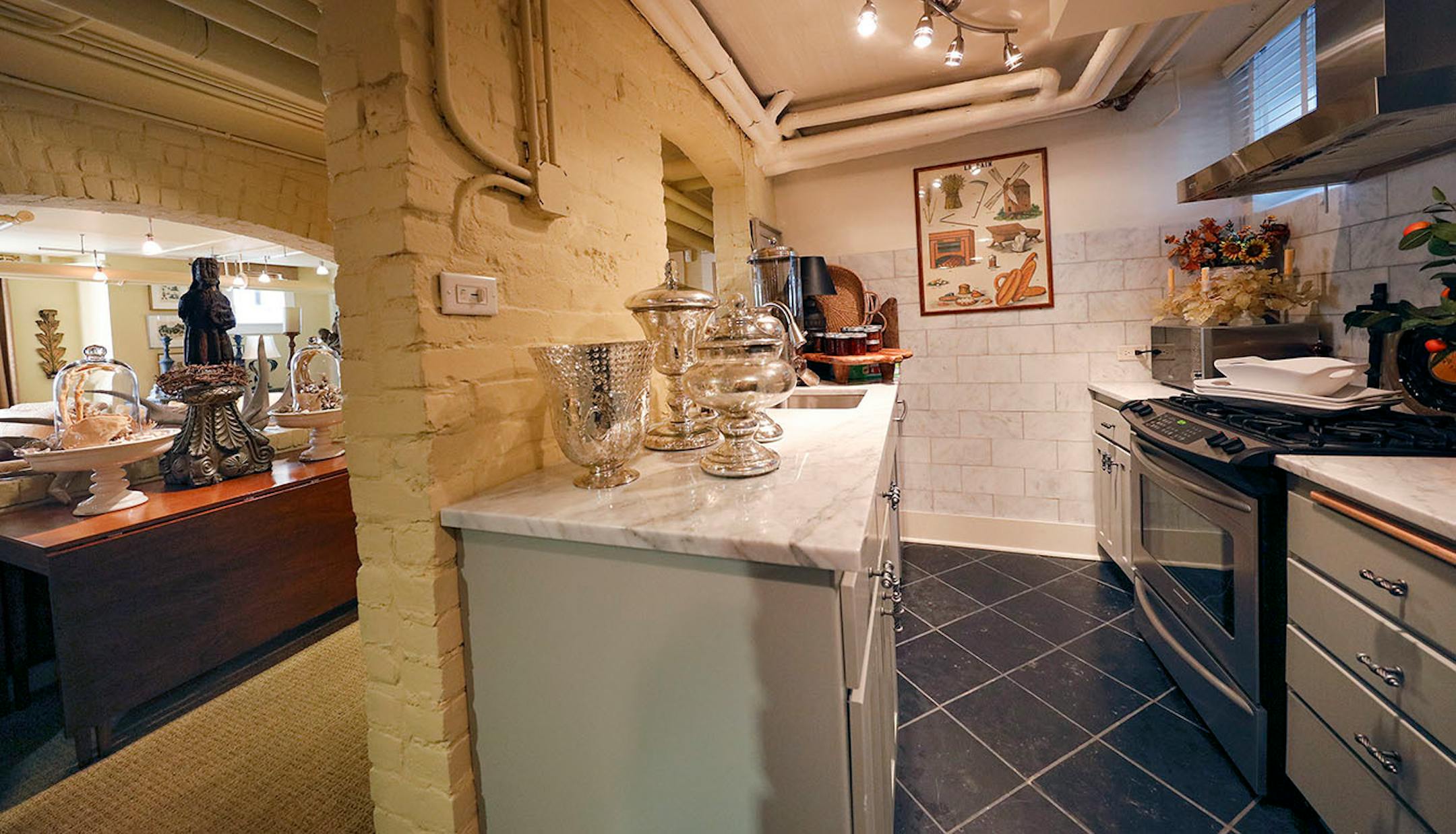 The lower level includes a kitchen.