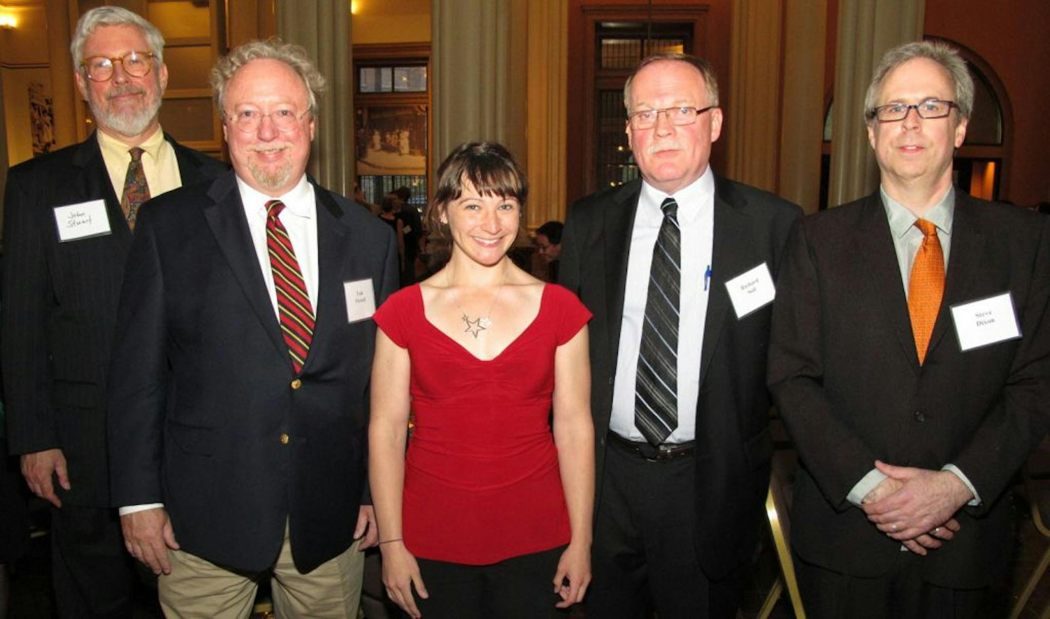 Award winners: John Stuart of the State of Minnesota Board of Public Defense, Tom Pursell of Lindquist & Vennum, ILCM volunteer Liz Shaffer-Wishner, Richard Soli and Steve Dixon of Ruthless Films