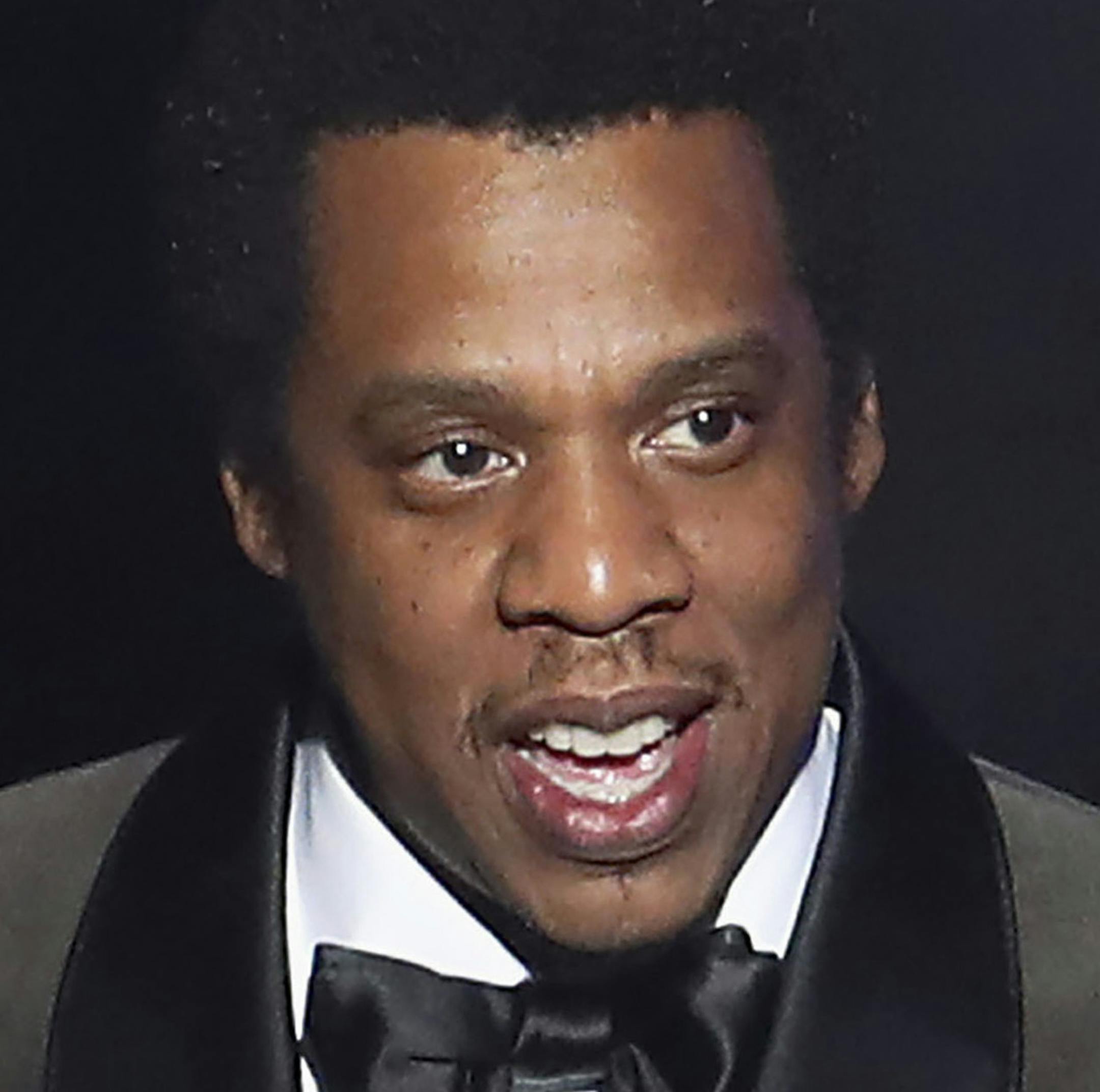 This combination photo shows Jay-Z speaking at the 2018 Pre-Grammy Gala And Salute To Industry Icons in New York on Jan. 27, 2018, left, and Rihanna at the 5th annual Diamond Ball benefit gala in New York on Sept. 12, 2019. Rihanna's Clara Lionel Foundation is donating $1 million in grants towards COVID-19 response — a number that is being matched by Jay-Z’s Shawn Carter Foundation. (AP Photo)