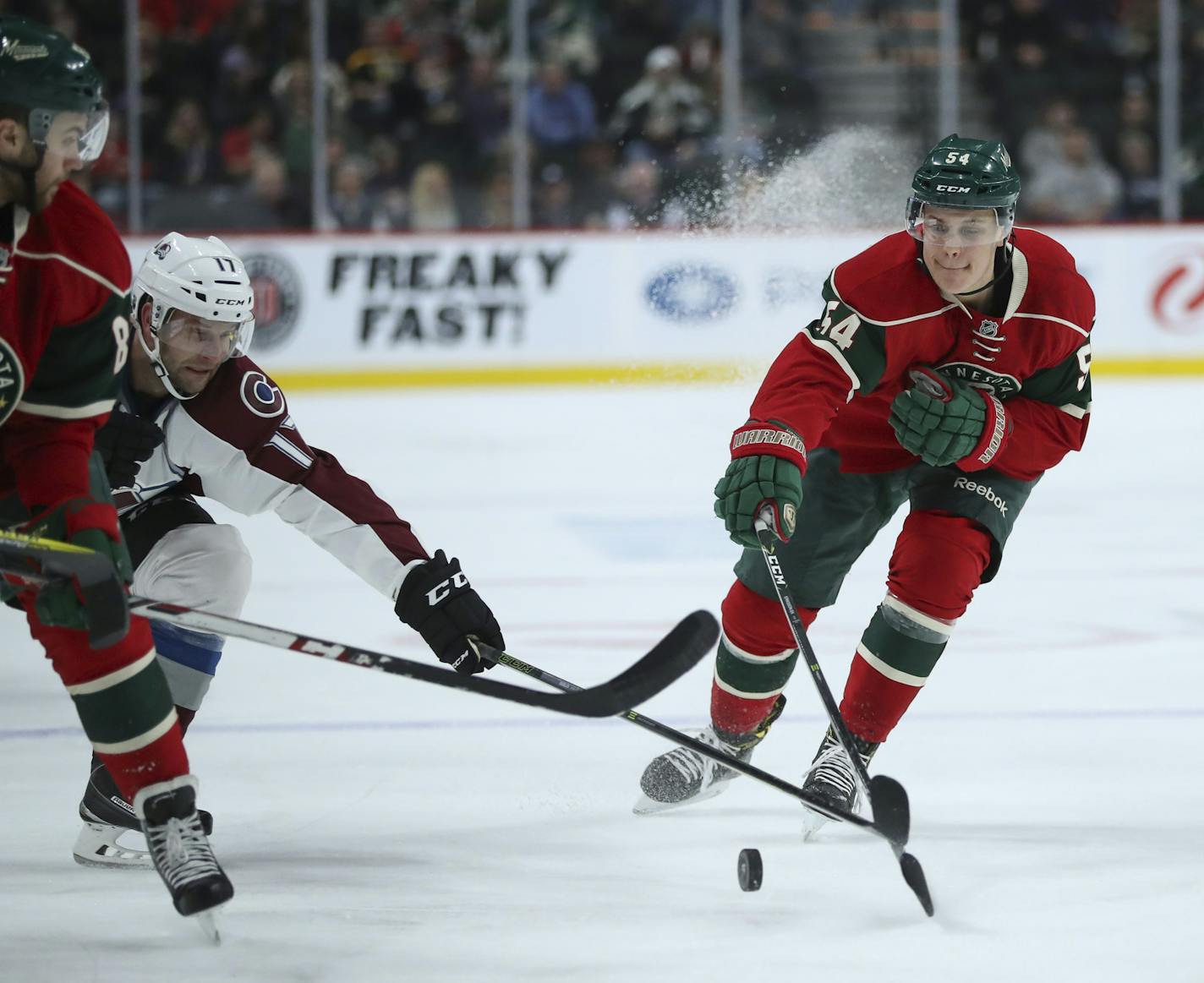 The Wild's Joel Erickson Et (54) reached for a puck while Colorado Avalanche right wing Mike Sislo (17) defended in the first period Tuesday night. ] JEFF WHEELER &#xef; jeff.wheeler@startribune.com The Minnesota Wild played their first preseason game of the year against the Colorado Avalanche Tuesday night, September 27, 2016 at Xcel Energy Center in St. Paul.