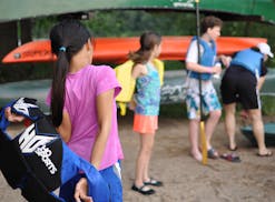Photo by Liz Rolfsmeier Participants got suited up for a parent-child kayak class last week at Lebanon Hills Regional Park.