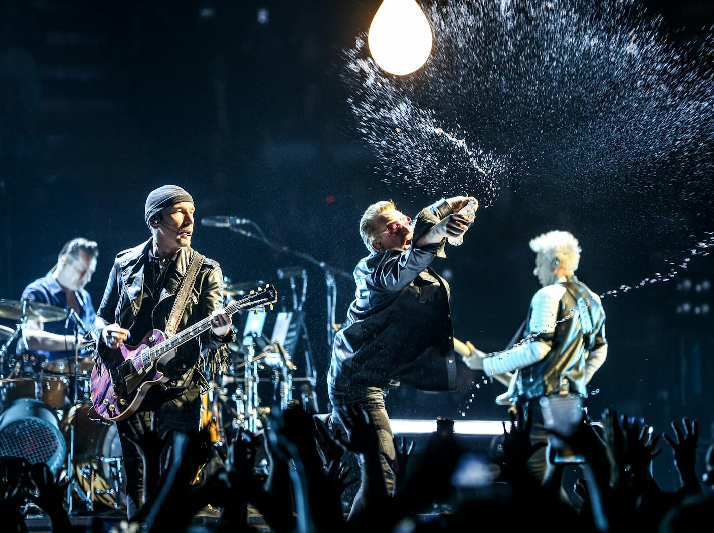 Larry Mullen Jr., from left, The Edge, Bono and Adam Clayton of U2 perform at the Innocence + Experience Tour at The Forum on Tuesday, May 26, 2015, in Inglewood, Calif. (Photo by Rich Fury/Invision/AP) ORG XMIT: CARF109