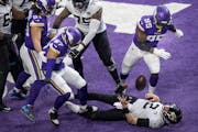 Jacksonville Jaguars quarterback Mike Glennon (2) fumble the ball in the end zone after his was sacked for a safety by Minnesota Vikings defensive end