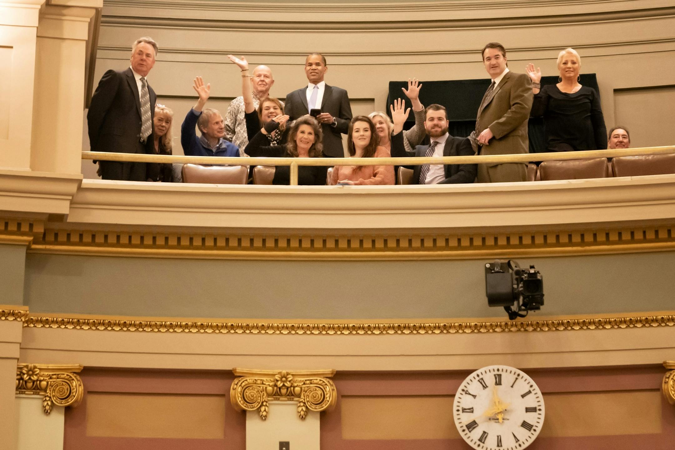 Family members of House Speaker Melissa Hortman waved to her from the House gallery as she arrived on the House floor before being elected House Speaker.