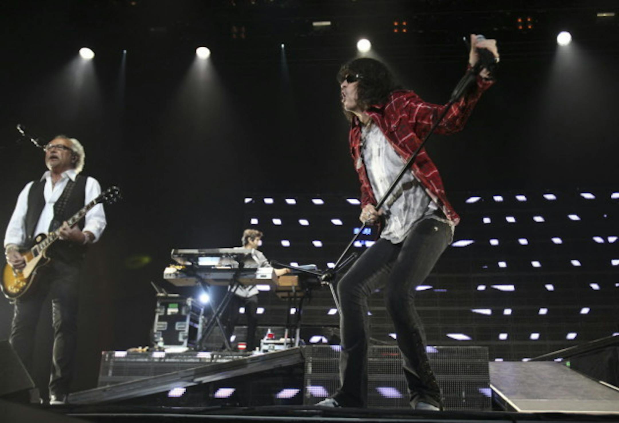 Foreigner leader Mick Jones, left, and replacement singer Kelly Hanson performed at Xcel Energy Center in 2011 with Journey. / Renee Jones Schneider, Star Tribune