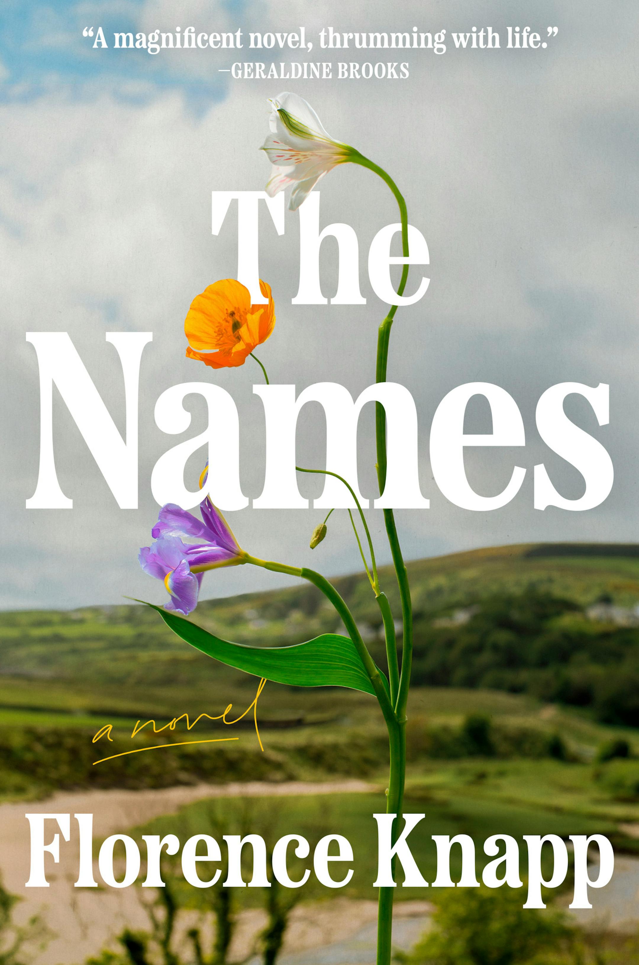cover of The Names features closeups of wildflowers with a hillside in the background