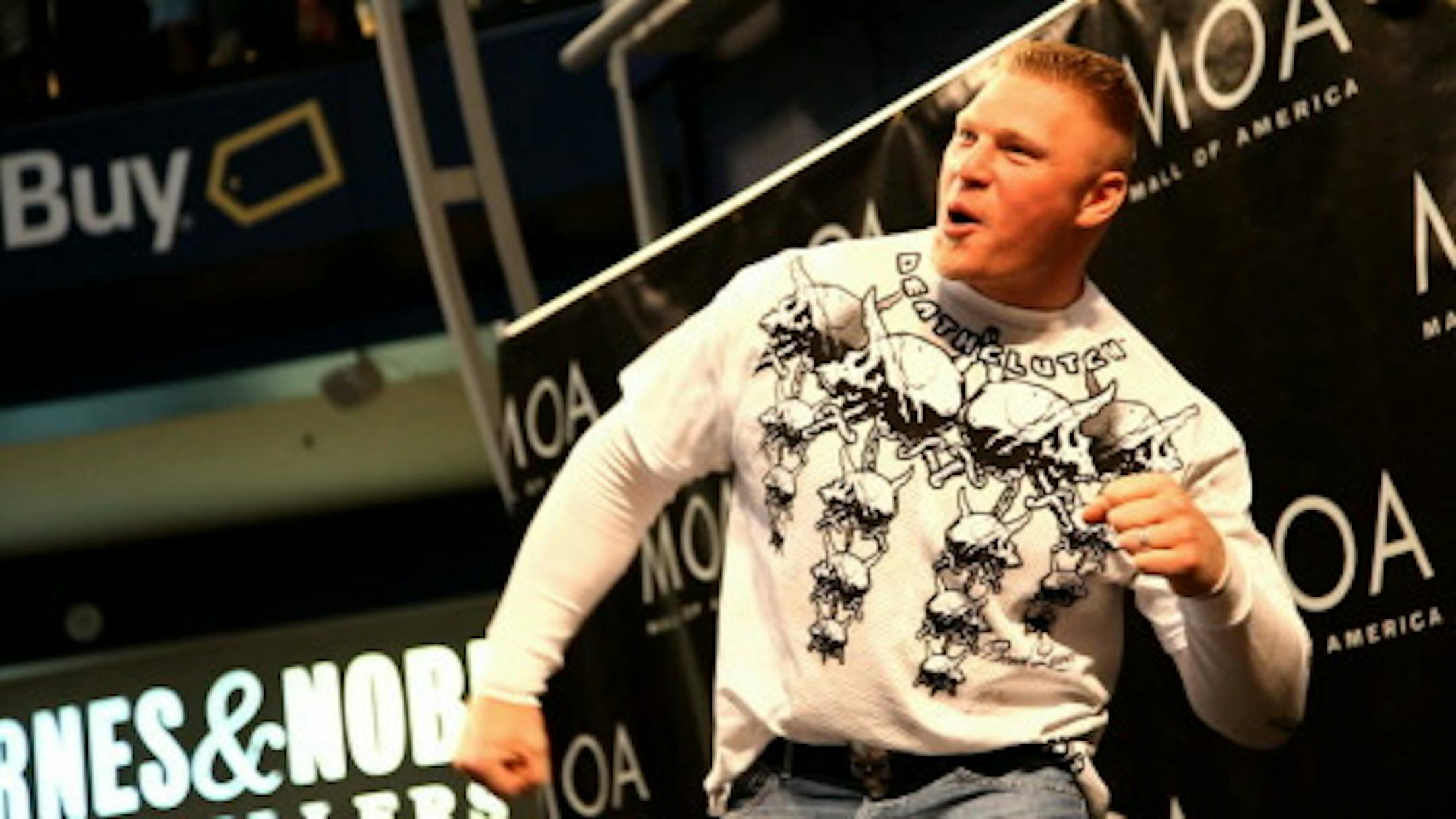 UFC star Brock Lesnar reacted to screaming fans as he came on stage at the Mall of America in 2009. Star Tribune file.