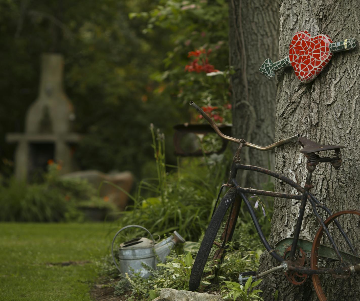 Mosaics mingle with found objects in Wouterina de Raad's garden last summer. ] JEFF WHEELER &#xef; jeff.wheeler@startribune.com Artist Wouterina de Raad's garden is a showcase for her concrete mosaic sculptures on her farm in Beldenville, WI. Her gardens were photographed Tuesday, July 29, 2014.