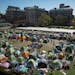 Pro-Palestinian protesters camp on a lawn at Columbia University in New York, Monday morning, April 22, 2024. Columbia University announced early Mond