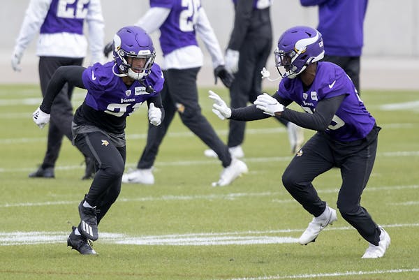 Minnesota Vikings cornerback Mike Hughes, left, took to the field for practice at TCO Performance Center, Thursday, September 17, 2020 in Eagan, MN. ]