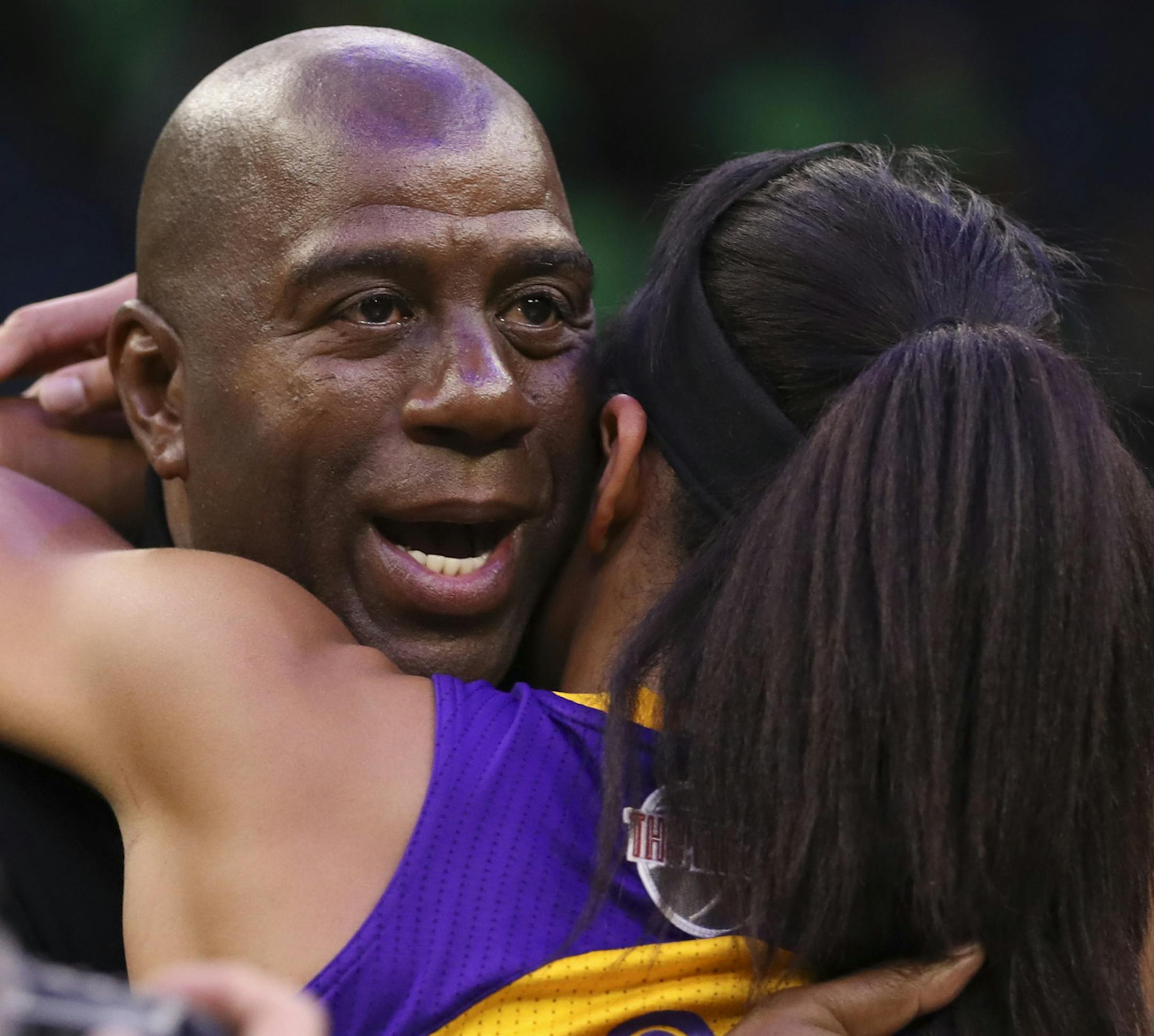 Sparks co-owner Magic Johnson hugged Sparks forward Candace Parker after the Los Angeles win. ] JEFF WHEELER &#xef; jeff.wheeler@startribune.com The Minnesota Lynx lost to the Los Angeles Sparks 77-76 in the winner-take-all Game 5 of their WNBA Finals series Thursday night, October 20, 2016 at Target Center in Minneapolis.